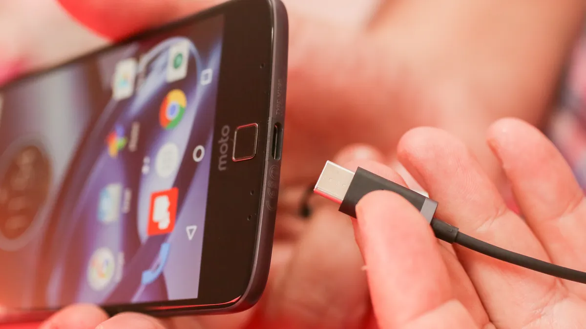 Cleaning Android phone charging port using soft brush